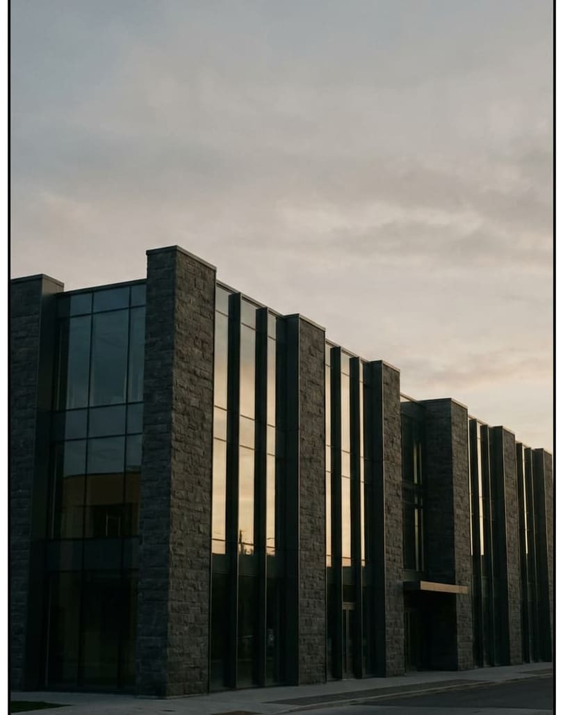 Finished building glowing at dusk